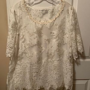 Pretty Angel blouse perfect for your Holiday season.  Size XL.  Off White